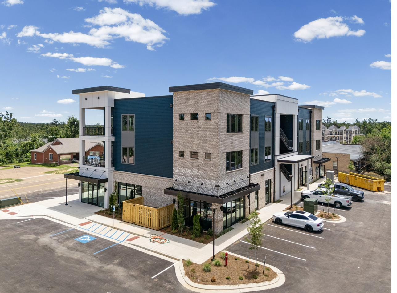 The Breakaway Oxford on North Lamar Boulevard in the heart of Midtown, with its ground-floor storefronts, seen from above